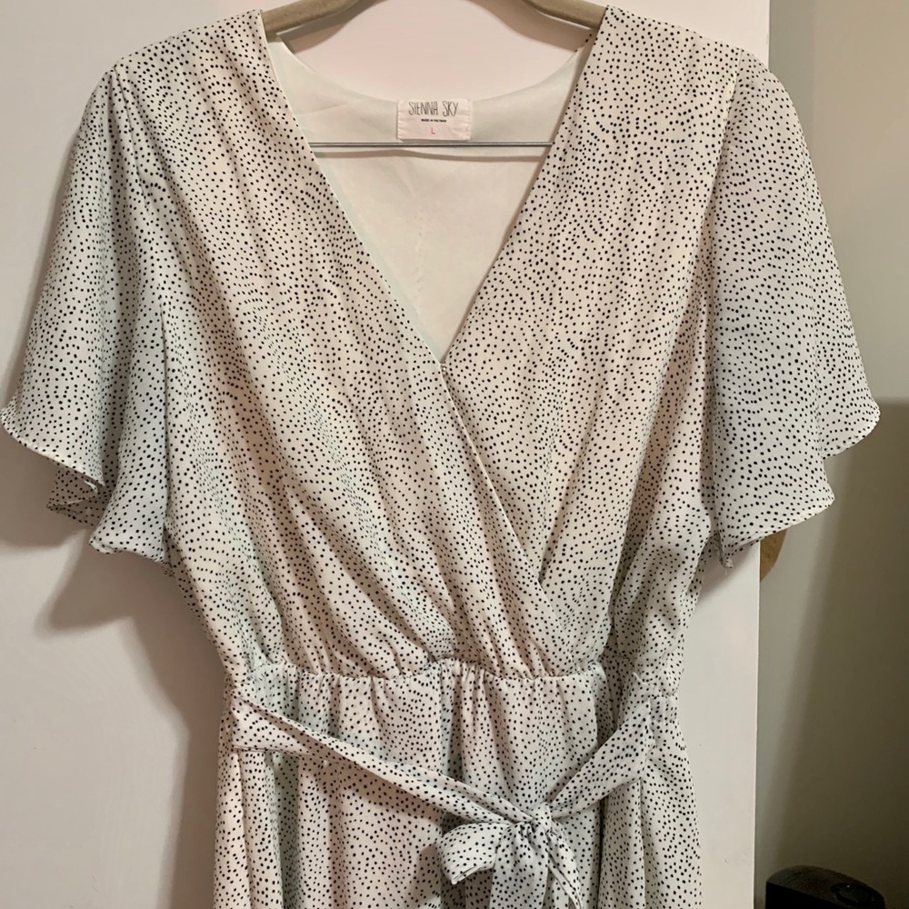 Cute faux wrap polka dotted dress